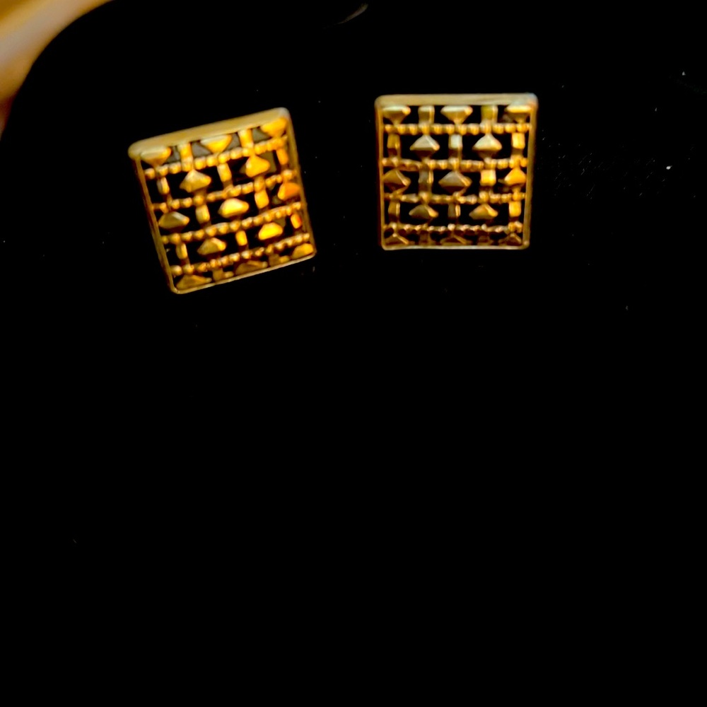 Vintage 1940s cufflinks, gold with black and art deco design.